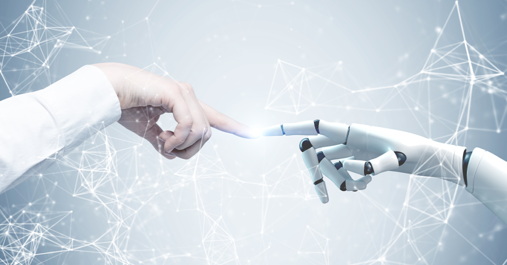 Maintenance du futur - Un bras humain et un bras robotisé entrent en contact en se touchant l'index.